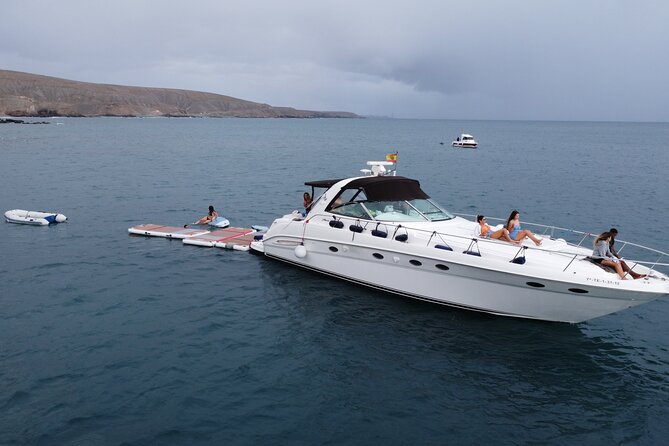 4 Hour Boat Tour with Snorkeling from Puerto Rico and Mogan - Stop 1: Playa Taurito for an easy beach reset