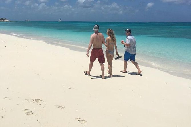 4-Hour Catamaran Sail and Snorkel Tour from Grace Bay - Lunch on the return: deli sandwiches, fresh fruit, and rum punch