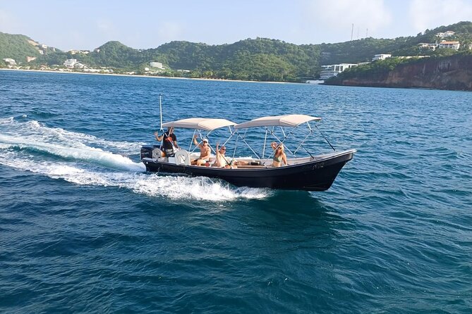 4-hour snorkel cruise to Underwater Sculptures with boat dogs - Stop 3: beach time, swimming choices, and sand under your feet