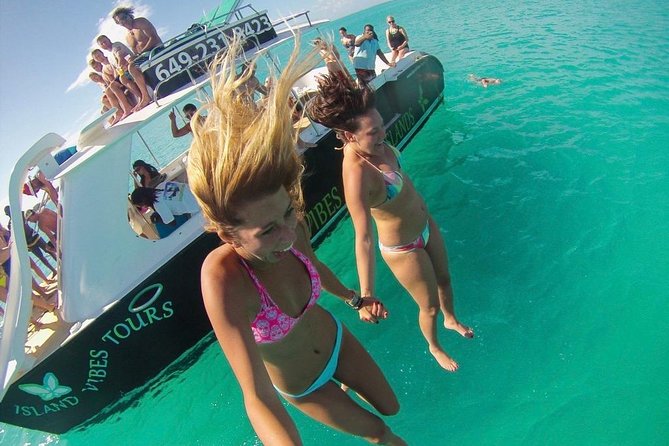 4hour Group Half Day Snorkeling Excursion in Grace Bay - Grace Bay Beach finish: rooftop jump time and curved slides