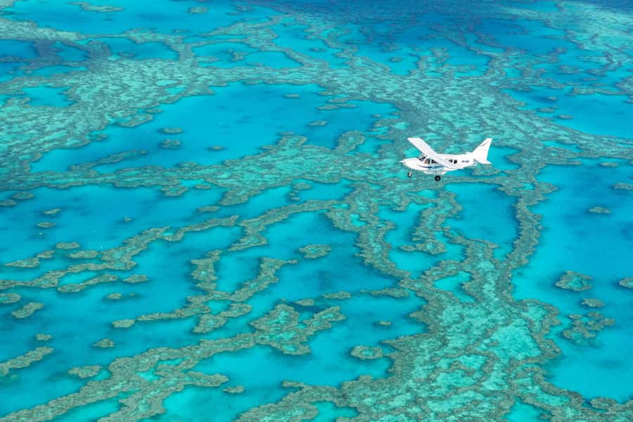 Airlie Beach: Fly Raft Package w Scenic Flight & Snorkeling - Entering the sky: the 60-minute scenic flight over Heart Reef and Whitehaven