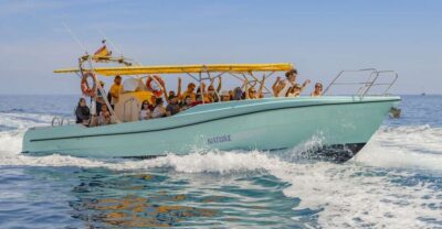 Alcudia: Coll Baix Beach & Sea Caves Cruise with Snorkeling - The first sea stop at Platja del Coll Baix: snorkeling, swimming, and paddleboarding