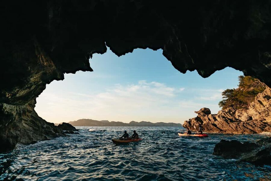 Alcudia: Guided Sea Kayaking Tour with Snorkeling - Swimming and scenic views on the way back