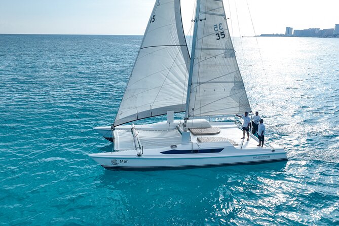All-Inclusive Isla Mujeres Catamaran with Free Transportation - First Stop: Playa Tortugas Check-In Without the Headache