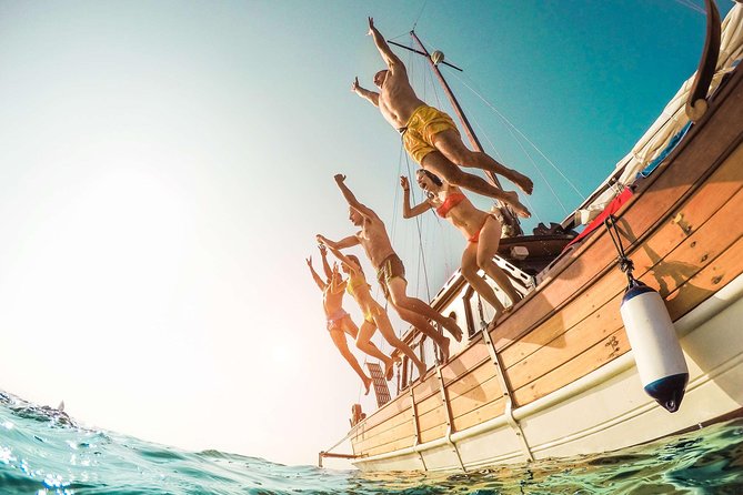 Amalfi Coast & Positano: Boat Tour with Snorkeling & Drinks - Stop 4: Praiano and the Africana Grotto blue-light look