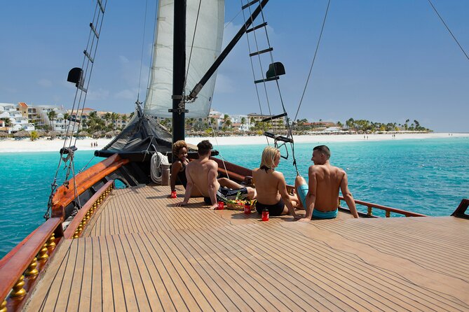 Aruba Jolly Pirate Afternoon Sail with Snorkeling - Getting aboard: MooMba Beach to a teak deck and easy check-in