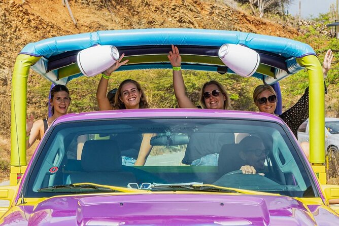 Aruba National Park Tour with Natural Pool & Baby Beach Snorkel - Pickup, Open-Air Transport, and Group Comfort