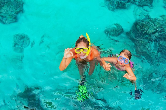 Bali Blue Lagoon Snorkeling Experience - Blue Lagoon Beach: Calm Water and Coral Prospects