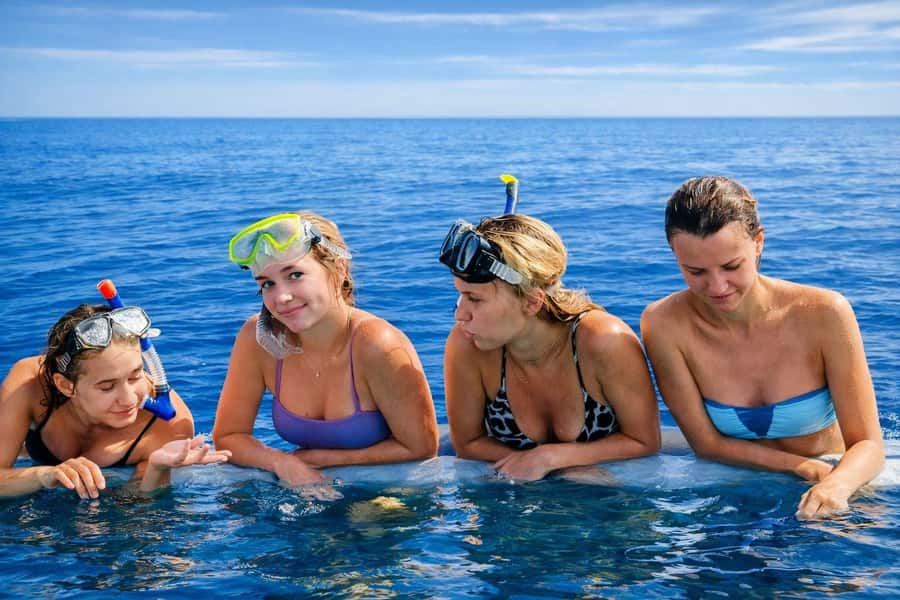 Bali/Lovina: Guided Dolphin Watching & Sunrise Boat Snorkel - Getting to the boat: pickup options and early timing