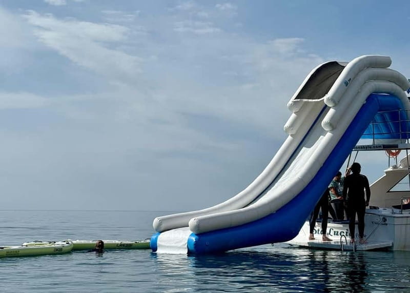 Benalmádena Boat Tour with Snorkeling, Water Slide and Lunch - Swim Time Plus the 20-Foot Waterslide Into the Sea