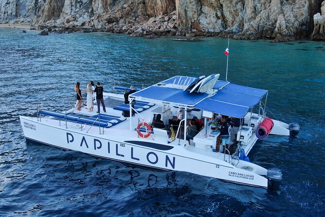 Cabo San Lucas All-Inclusive Private Catamaran Snorkeling Cruise - Stop 3: Medano Beach for the Cabo shoreline energy