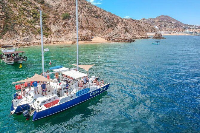 Cabo San Lucas and Santa Maria Bay Snorkeling Sightseeing Cruise - The boat ride: scenery, music, and wildlife chances