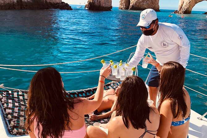 Cabo San Lucas and Santa Maria Bay Snorkeling Sightseeing Cruise - Stop 1: Los Cabos dock time and getting aboard smoothly