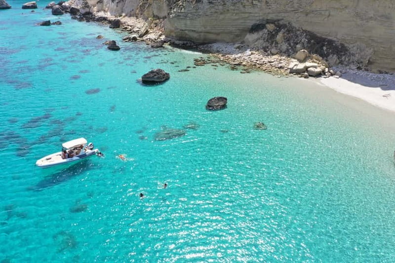 Cagliari: Boat Tour, 4 Stops, Swim, Snorkeling, & 1 Spritz - Dolphins, music, and that skipper personality factor