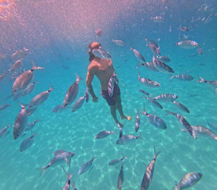 Cagliari: Boat Tour, 4 Stops, Swim, Snorkeling, & 1 Spritz - Cala Bernat: swim-ready water and a quick orientation stop