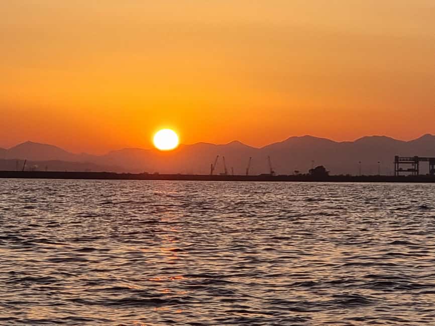 Cagliari: Boat Tour, 4 Stops, Swim, Snorkeling, & 1 Spritz - Poetto Beach: winding down on the last leg