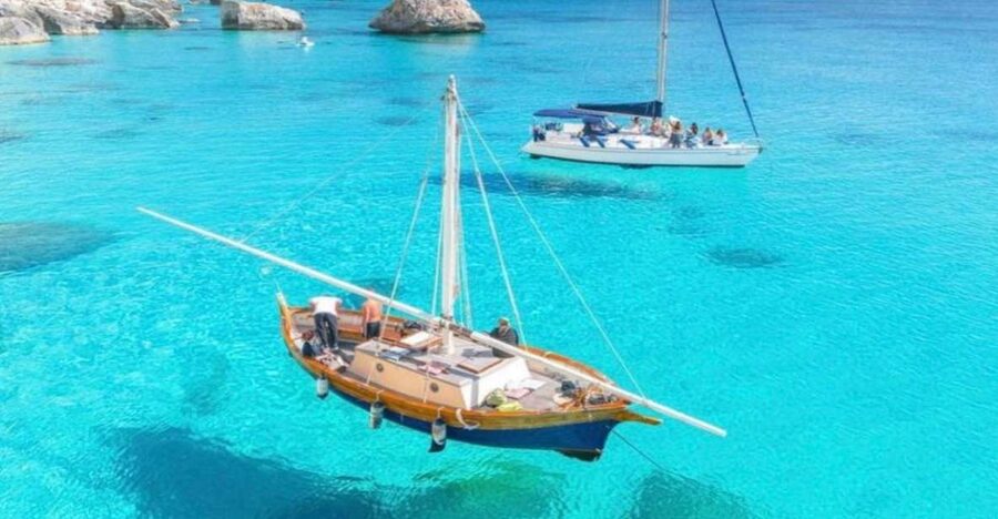 Cagliari: Boat Tour with Swim Stops, Snorkeling, & Aperitif - From Marina Piccola to the first swim stop in minutes