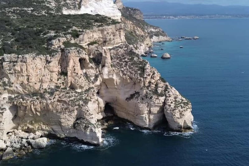 Cagliari: Catamaran Tour, Swimming, Snorkeling, & Prosecco - The return to Cagliari: music, drift moments, and the Prosecco toast