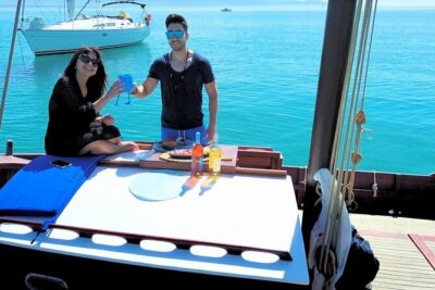 Cagliari Gulf Boat tour : 5 stops, snorkeling & local aperitif - Stop 1: Cala Bernat’s Aragonese Fortress Water Colors