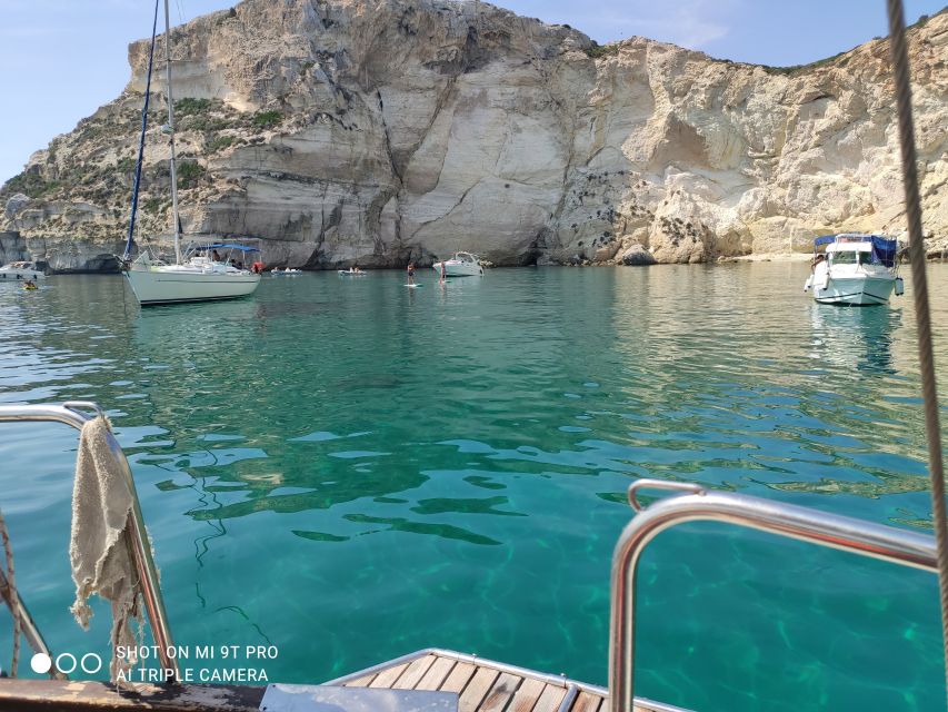 Cagliari Sailing Boat Tour with Snorkeling and Drink - Sella del Diavolo from the water: cliffs, coves, and a legend