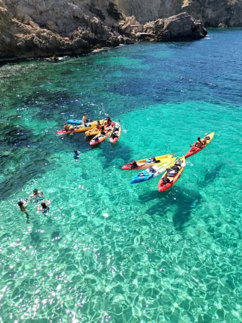 Cala Codolar: Guided Sea Kayaking and Snorkeling Tour - Morning vs sunset: pick the pace and the reward