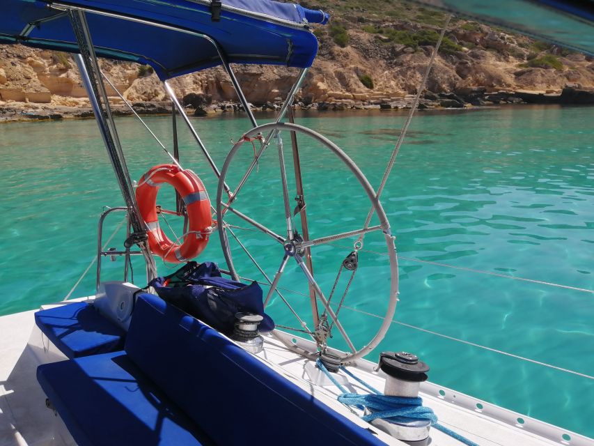 Can Pastilla: Sailboat Tour with Snorkeling, Tapas & Drinks - Captain Andres and the tone onboard