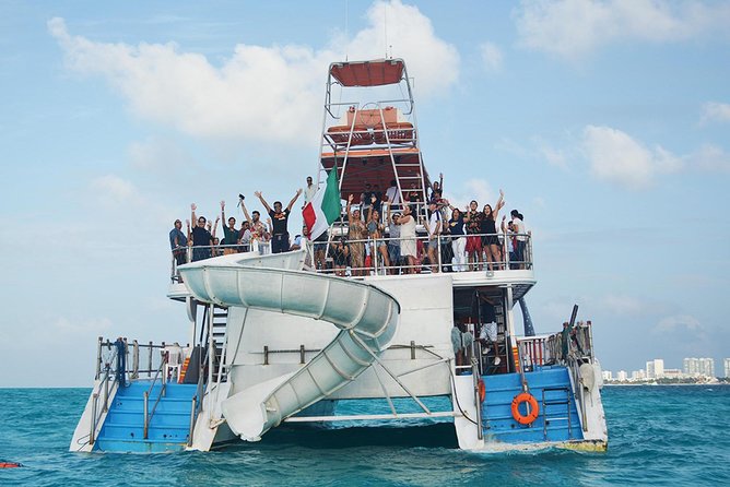 Cancun Dancer Cruise to Isla Mujeres with Snorkeling and Lunch - El Meco Reef Stop: Snorkeling Gear, Clear Water Time, and Slide Fun