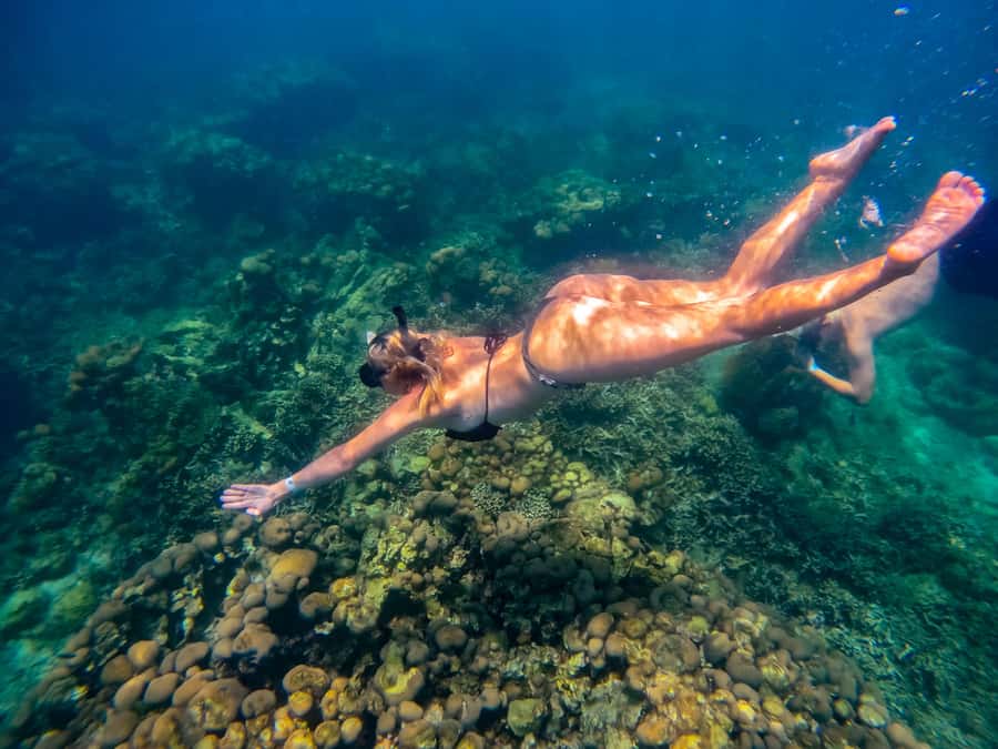 Cartagena: Rosario Islands Day Tour with Snorkel & Lunch - Isla Grande and Encantada Beach Club: your first hit of white sand