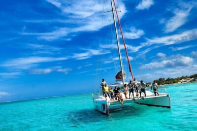 Catamaran Adventure Full Day: Ile aux cerfs,GRSE Waterfall,Snorkeling &BBQ Lunch - Snorkeling breaks plus BBQ lunch and unlimited drinks on board