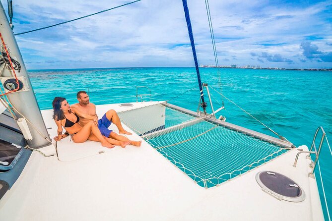 Catamaran to Isla Mujeres Snorkeling Tour with Open Bar and Lunch - Spinnaker + open bar: fun factor, with a few practical caveats