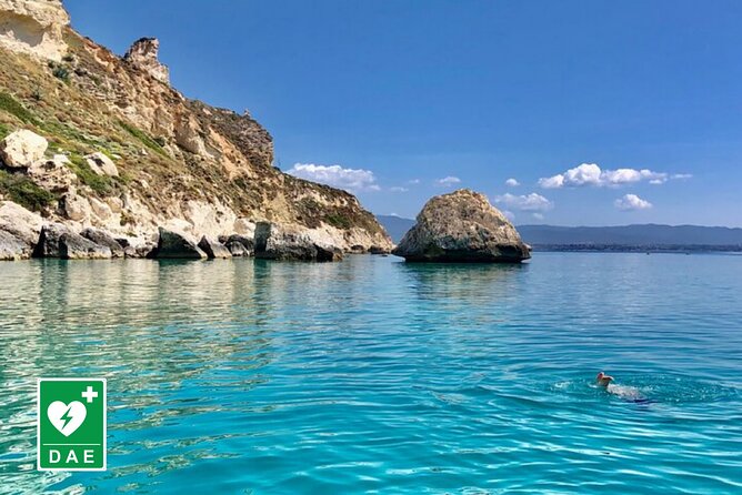 Catamaran tour stops bathing and snorkeling toast with prosecco - Cagliari’s south coast from the first minutes
