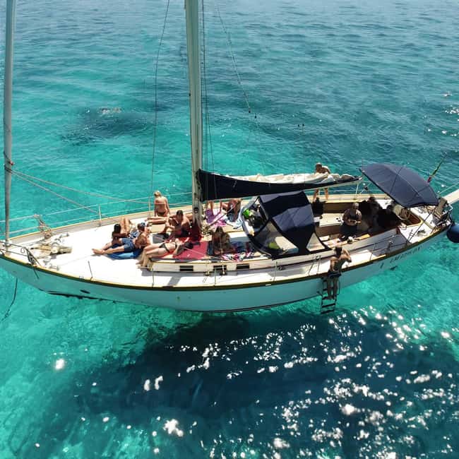 Catania: Boat Trip with Aperitif, Prosecco and Snorkeling - From Catania to Aci Trezza: what kind of day this really is