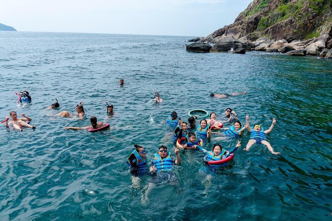 Coral Reef Snorkeling and Floating Bar Party from Nha Trang - Stop 1: Hòn Tằm for coral snorkeling, swimming, and brunch
