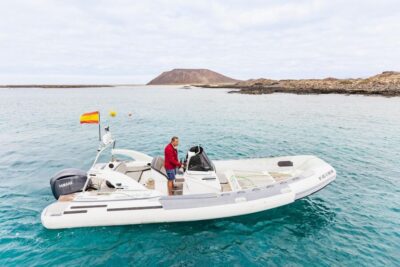Corralejo: Lobos Island Catamaran Tour with Drinks & Snorkel - Lobos Island Approach: La Caldera and the El Río crossing