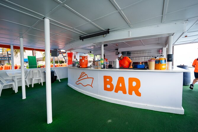 Dancer Cruise Isla Mujeres Snorkel Food and Drinks Included - Step one on the water: Arrecife El Meco snorkeling and ocean play