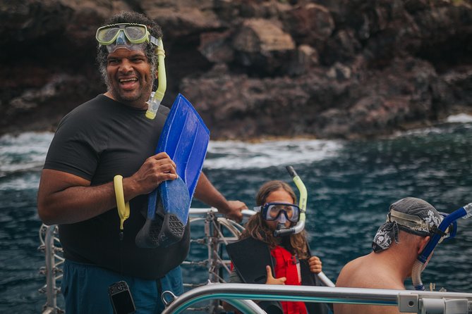 Deluxe Snorkel & Dolphin Watch Aboard a Luxury Catamaran from Kailua-Kona - In-water and onboard options: slide, high-jump platform, and swim fun