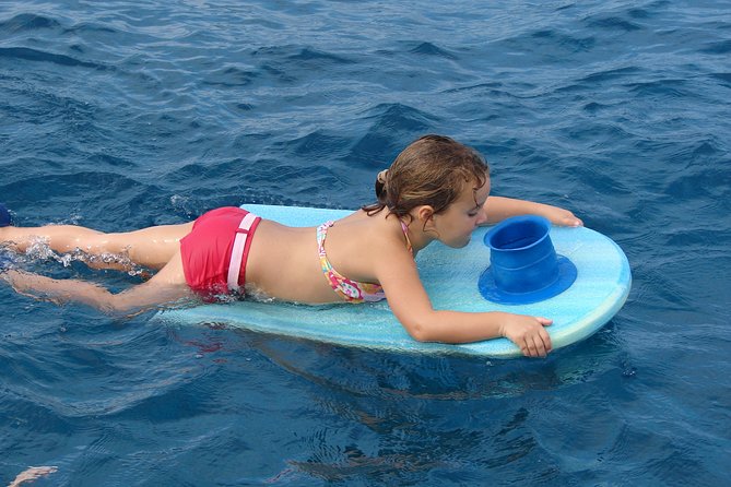 Deluxe Snorkel & Dolphin Watch Aboard a Luxury Catamaran from Kailua-Kona - Price and value: what you get for about $183.77 per person