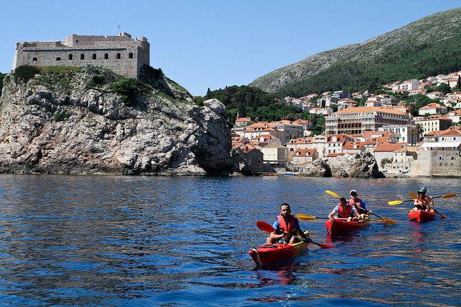 Dubrovnik: Sunset Kayaking & Snorkeling with water &wine - Paddling around Lokrum: the sunset viewpoint from the water