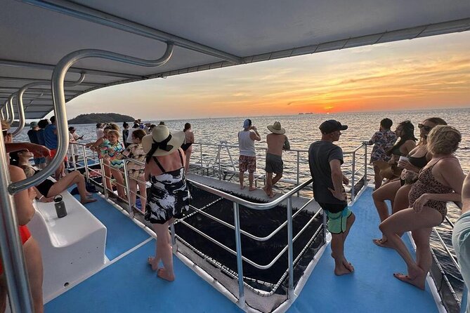 Flamingo Family Fun Catamaran Snorkel:Comfortable shaded seating - Getting on board at Planet Dolphin Catamaran in Playa Flamingo