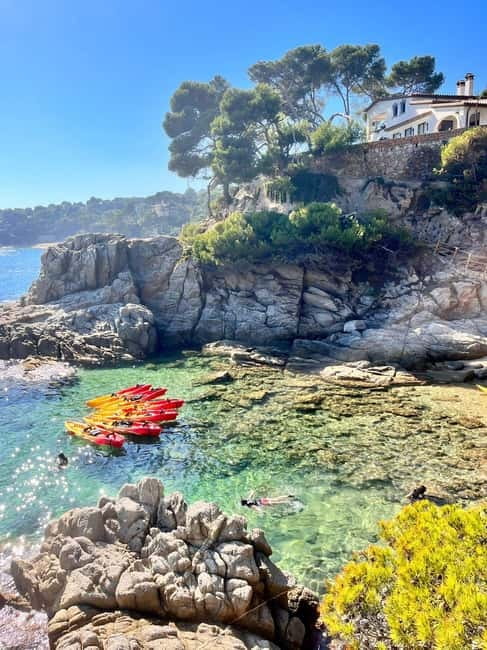 From Barcelona: Costa Brava Kayak & Snorkel Tour with Picnic - 4 hours of kayaking: caves, coves, and pacing the group