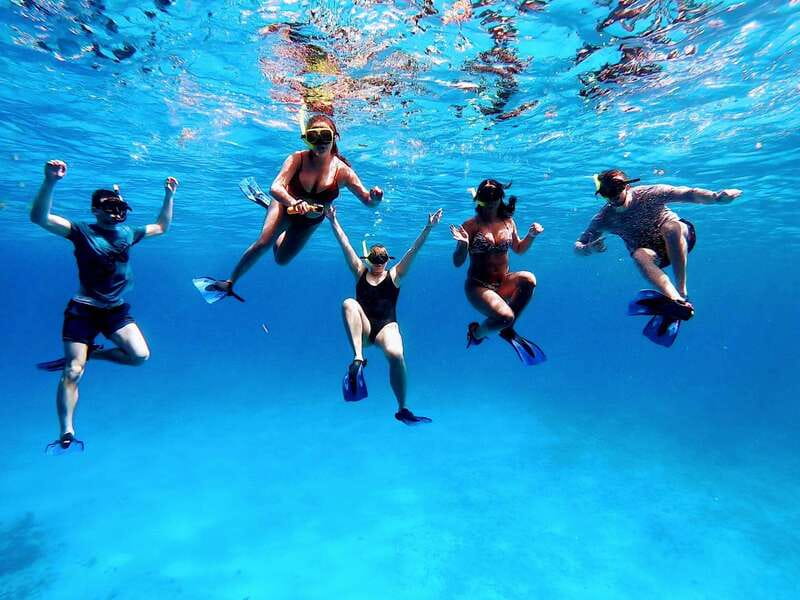From Cozumel: 3 Reefs Boat Tour with Drinks and Snorkeling - Stop 2: sandy-bottom snorkeling and starfish spotting