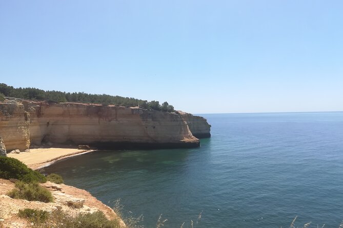 From Faro: Benagil Hiking Cliffs and the 4 Treasure Experience - What you get included: van, umbrella, mask, and free entry stops