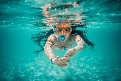 From Ka'anapali: West Maui Half-Day Snorkel Tour w/ Food - On the catamaran toward west Maui: dolphins, whales, and a smart game plan