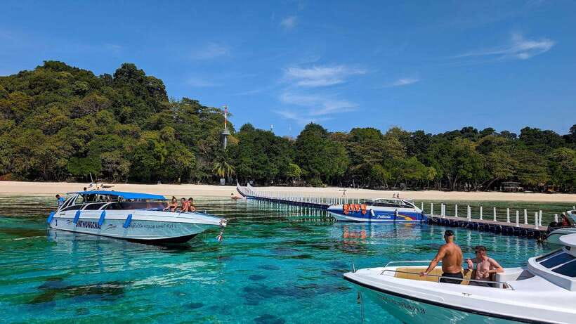 From Koh Lanta: Koh Haa & Koh Rok Snorkel Tour by Speedboat - Koh Haa (Five Islands): reef snorkeling where fish show up fast