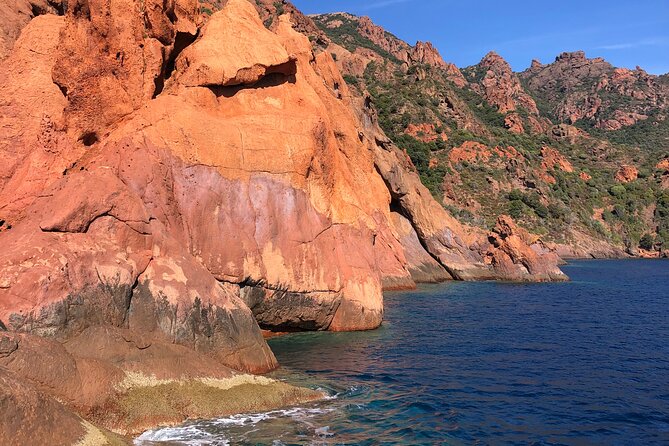From Sagone/Cargèse: Scandola Girolata Calanques Piana Snorkeling - Capo Rosso: the natural arch, coastal caves, and a snorkel moment