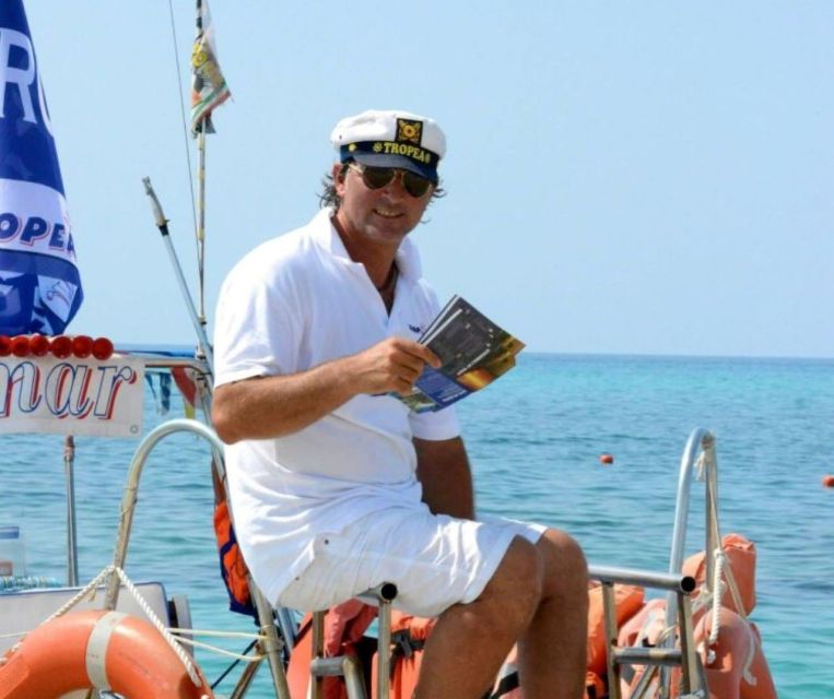 From Tropea: Capo Vaticano boat tour with snorkel & aperitif - The onboard vibe: music, dancing, and an included aperitif