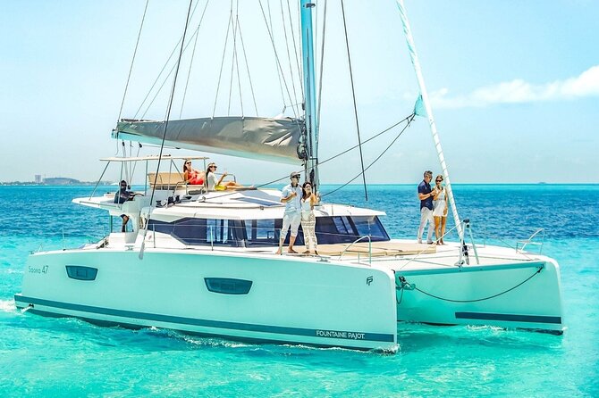 Full Experience Isla Mujeres: Food aboard + Premium drinks + Snorkel + Free time - Stop 1: El Meco Snorkeling and the Famous Fingers Sculpture