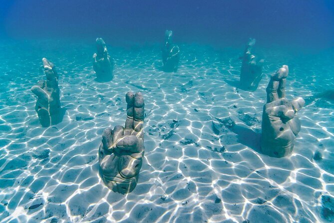 Full Experience Isla Mujeres: Food aboard + Premium drinks + Snorkel + Free time - Swimming, Snorkeling, and Weather: Plan for a Flexible Day