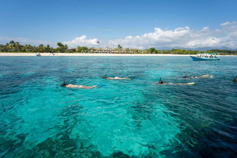Gili Islands: Private or Shared Snorkeling Boat Trip - Underwater statues and Bask Nest sculptures: where the camera work matters