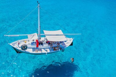 Guided day by boat in Carloforte with snorkelling and aperitif - Punta Nera views and early coast spotting: setting the tone fast